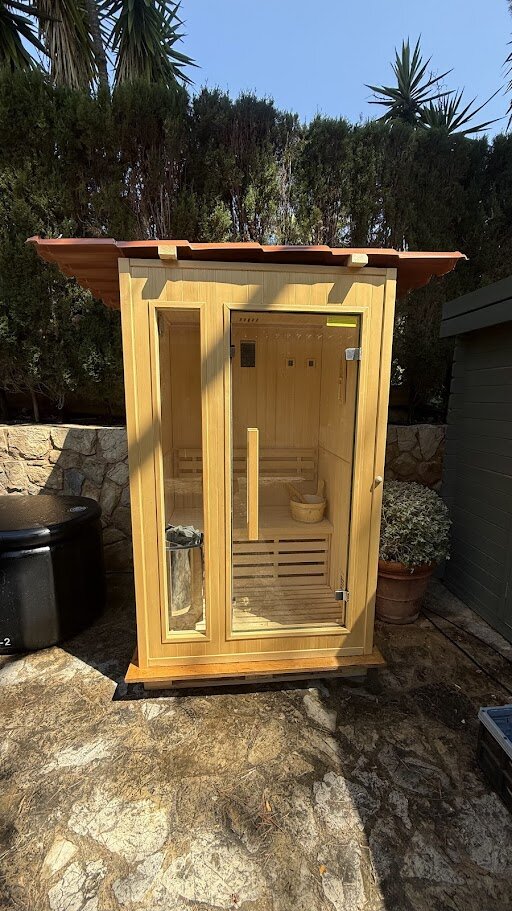 Compact 2-person outdoor sauna that plugs in anywhere